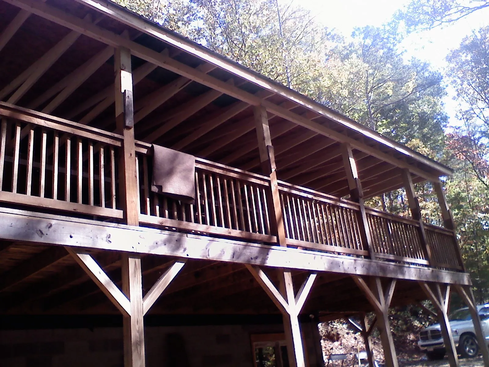 Timber framing under a new elevated porch and deck — Roof Leak Repair in Spiritwood by Roofing Brothers